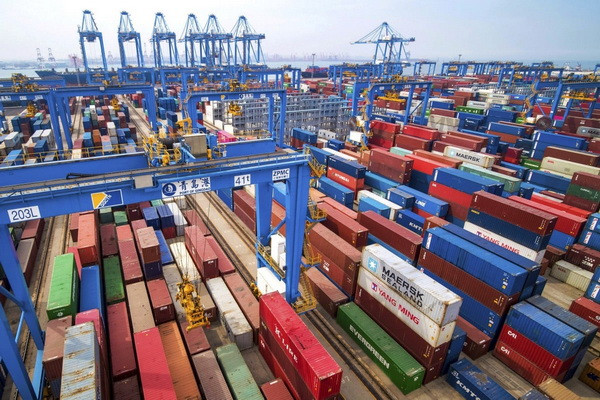 China’s foreign trade hits record high in challenging year China’s foreign trade hits record high in challenging year